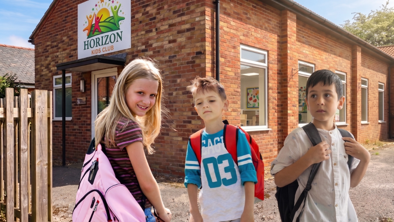 Children posing outside the Horizon Kids Club building