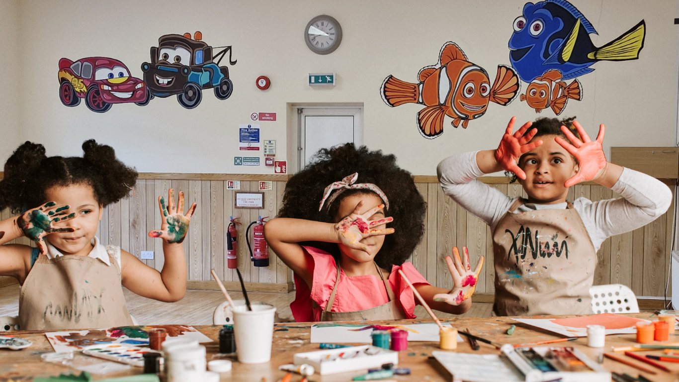 Children hand painting inside the Horizon Kids Club hall