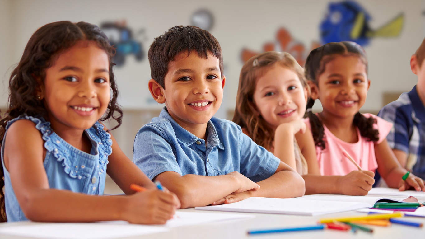 Happy children aged 8 smiling waiting for pickup