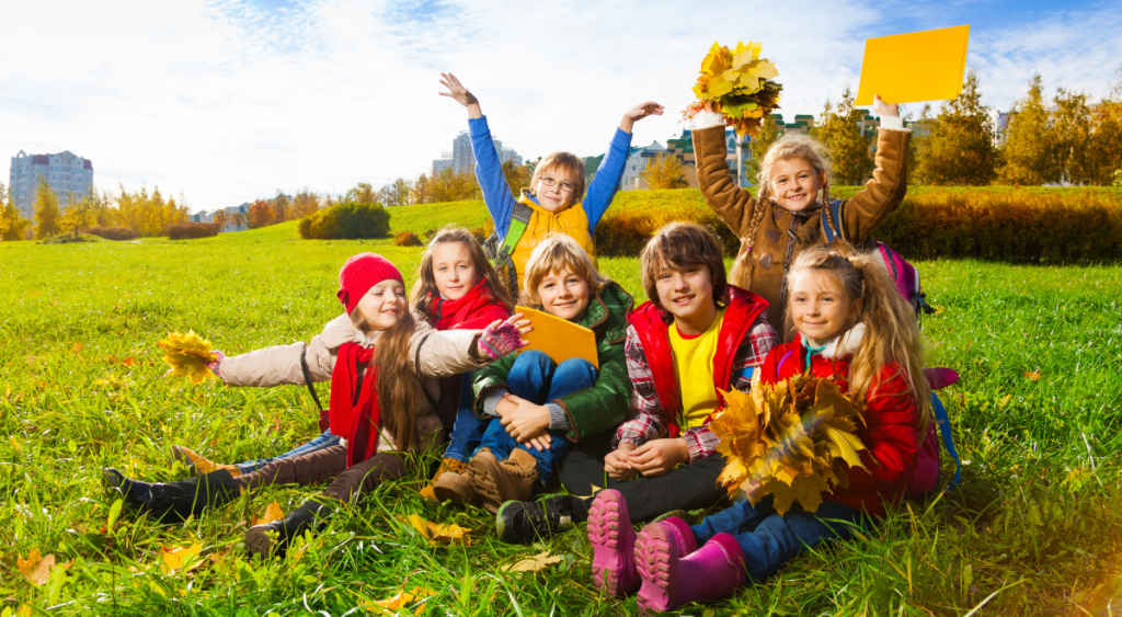 Kids playing outdoors in autumn
